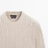 Pull en maille torsadée 100 % coton à col rond Pull en maille torsadée 100 % coton à col rond