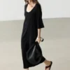 Robe midi avec détail aux manches Robe midi avec détail aux manches