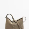 Sac en cuir refendu avec clous décoratifs