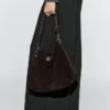 Sac en cuir suédé refendu avec œillets Sac en cuir suédé refendu avec œillets