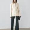 Veste en mélange de laine texturée avec boutons en strass