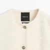 Veste en mélange de laine texturée avec boutons en strass