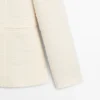 Veste en mélange de laine texturée avec boutons en strass